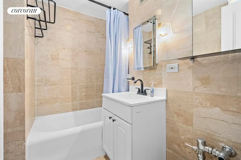 New York City Real Estate | View 45 Tudor City Place, 307 | Marble Bathroom | View 4