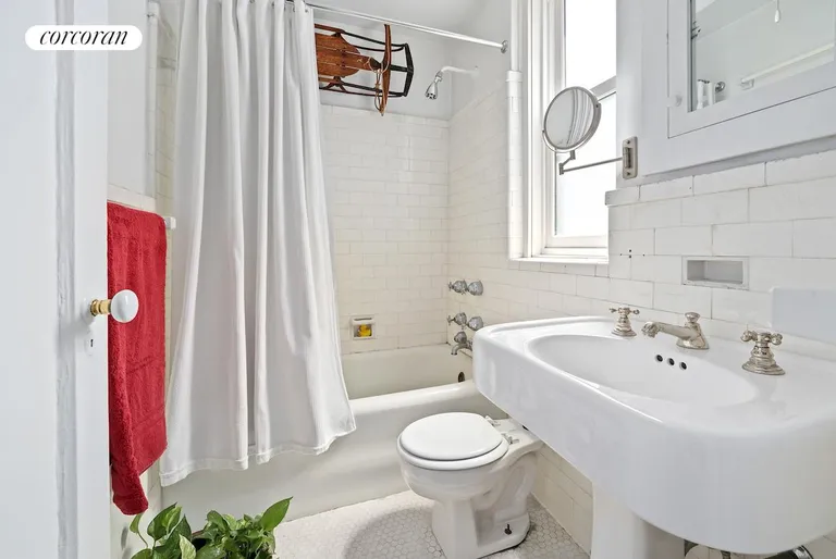 New York City Real Estate | View 35 West 9th Street, 7C | Bathroom, windowed | View 6