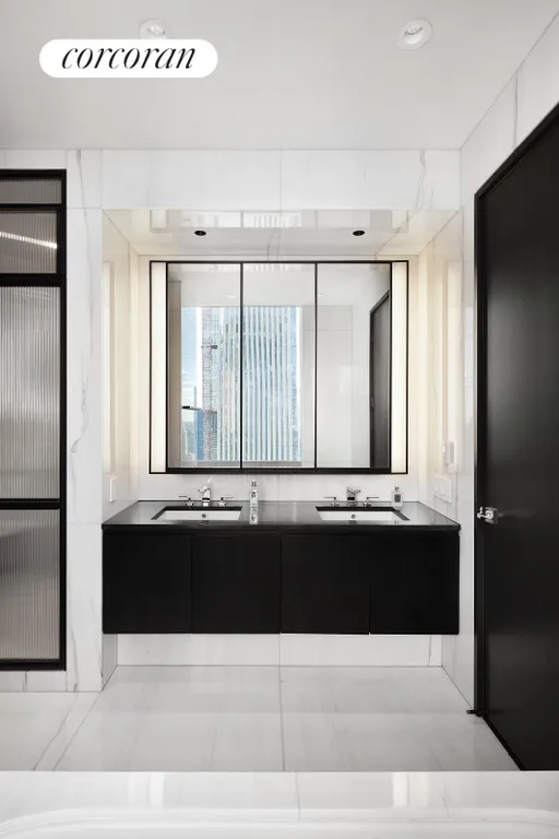 New York City Real Estate | View 157 West 57th Street, 53A | Primary Bathroom | View 12