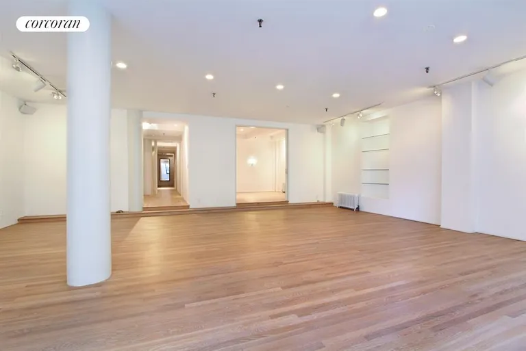 New York City Real Estate | View 114 West 27th Street, 7 FL | Living Room painted and floors redone | View 9