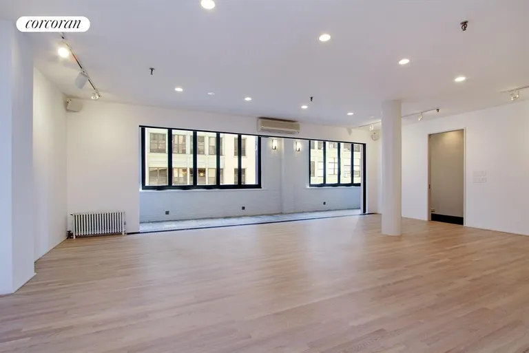 New York City Real Estate | View 114 West 27th Street, 7 FL | Living Room | View 10