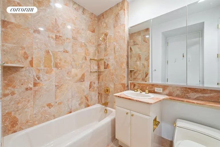 New York City Real Estate | View 845 United Nations Plaza, 18F | Marble bathroom | View 3