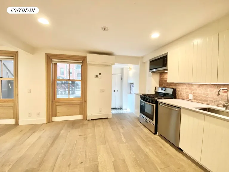 New York City Real Estate | View 407 Clermont Avenue, GARDEN | Living/Open Kitchen Space | View 4