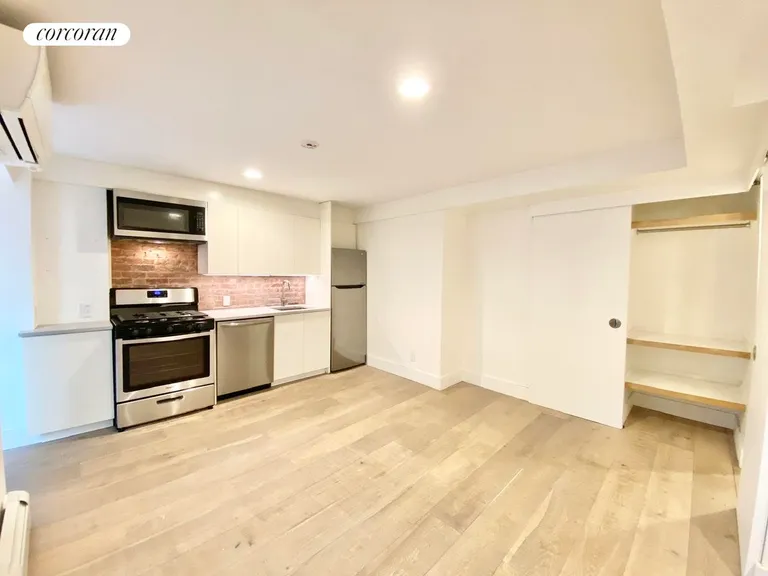 New York City Real Estate | View 407 Clermont Avenue, GARDEN | Living/Open Kitchen Space | View 8