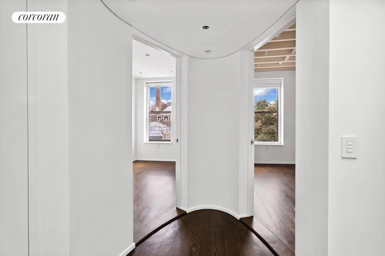 New York City Real Estate | View 18 Orchard Street, PH | Hallway to 2 lower level bedrooms | View 6