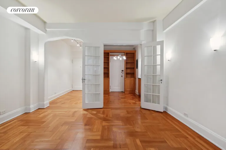 New York City Real Estate | View 40 West 67th Street, 7C | LR view into the foyer and kitchen | View 2