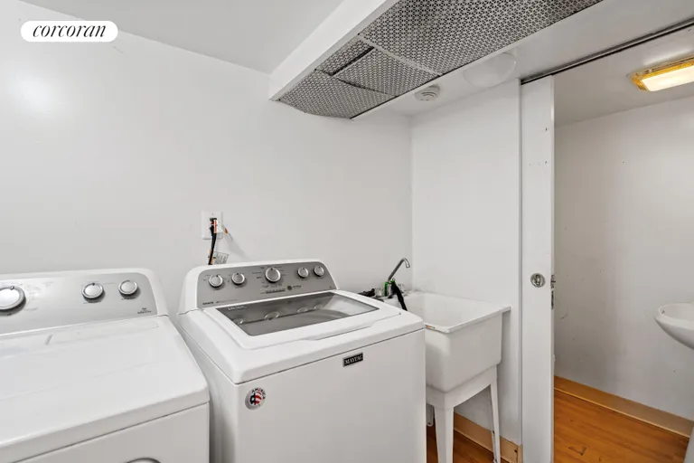 New York City Real Estate | View 506 White Plains Road | Laundry Room in Apt | View 15
