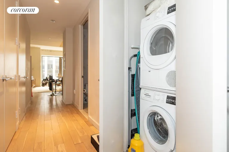 New York City Real Estate | View 75 Wall Street, 22E | Laundry Room in Apt | View 4