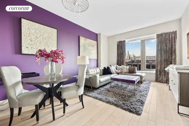 New York City Real Estate | View 75 Wall Street, 33P | Living area w dramatic Accent Wall | View 2