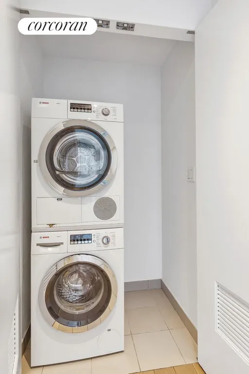 New York City Real Estate | View 22 River Terrace, 3R | Laundry Room in Apt | View 12