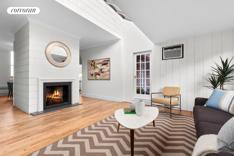 New York City Real Estate | View 161 East 90th Street, PHB | Living Rm w/ Wood Burning Fireplace | View 6