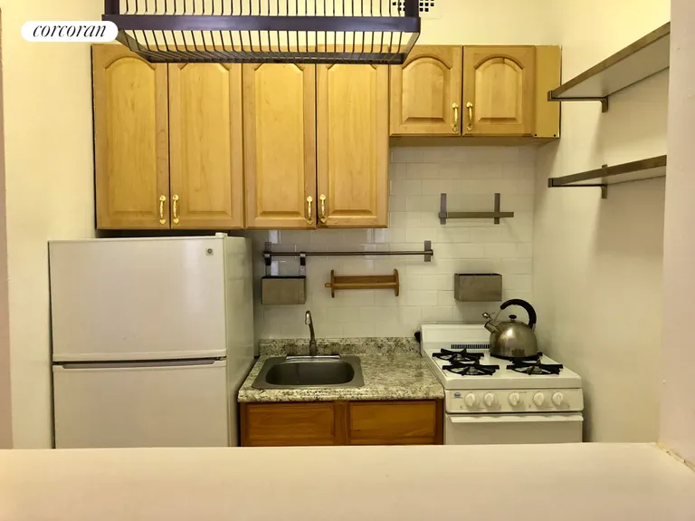New York City Real Estate | View 413 East 82nd Street, 3A | Built - in breakfast bar | View 3