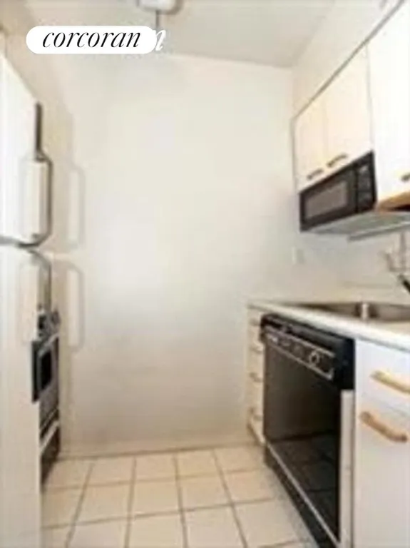 New York City Real Estate | View 393 West 49th Street, 3LL | Kitchen | View 4