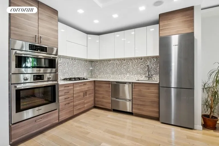 New York City Real Estate | View 300 Rector Place, 2Q | Open Kitchen | View 3