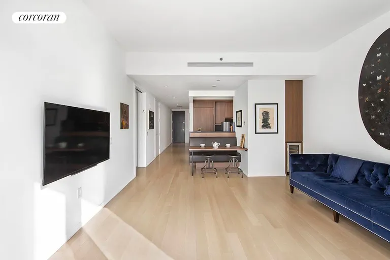 New York City Real Estate | View 50 West Street, 23B | Living Room | View 2