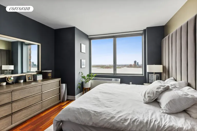 New York City Real Estate | View 30 West Street, 17G | Primary Bedroom | View 4