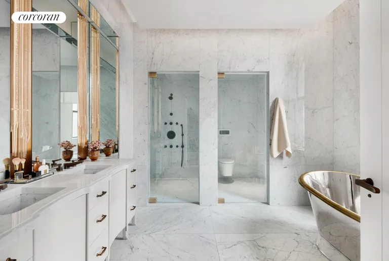 New York City Real Estate | View 111 West 57th Street, 14N | Primary Bathroom | View 8