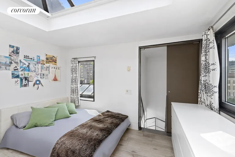 New York City Real Estate | View 525 Broome Street, PH6 | Sun-Filled Bedroom w/ Skylight | View 9