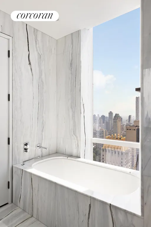 New York City Real Estate | View 157 West 57th Street, 50A | Master Bathroom | View 18
