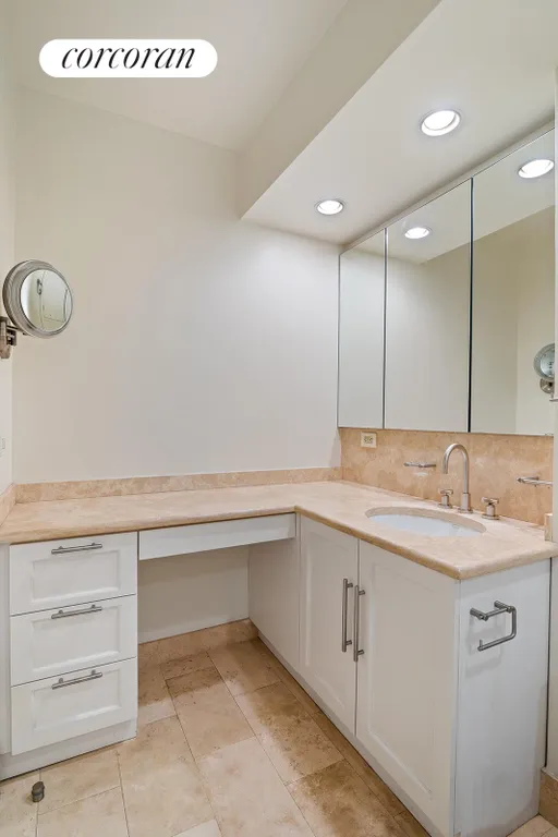 New York City Real Estate | View 340 East 64th Street, 5G | Primary Bathroom Dressing Table | View 12