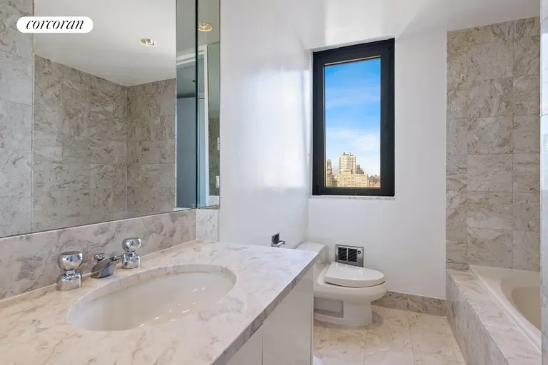 New York City Real Estate | View 100 United Nations Plaza, 32E | Windowed en suite master bathroom | View 8