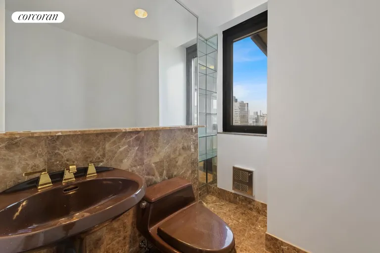 New York City Real Estate | View 100 United Nations Plaza, 32E | Windowed powder room | View 9