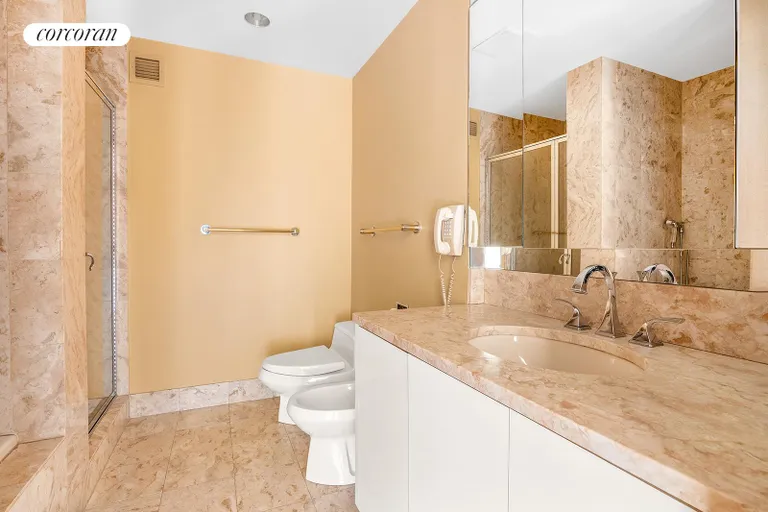 New York City Real Estate | View 100 United Nations Plaza, 38B | En suite marble bathroom | View 6