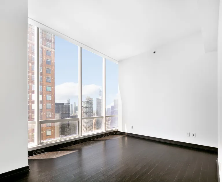 New York City Real Estate | View 157 West 57th Street, 56C | Bedroom | View 11