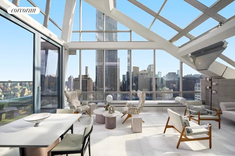 New York City Real Estate | View 157 West 57th Street, 41D | Solarium/Greenhouse | View 2
