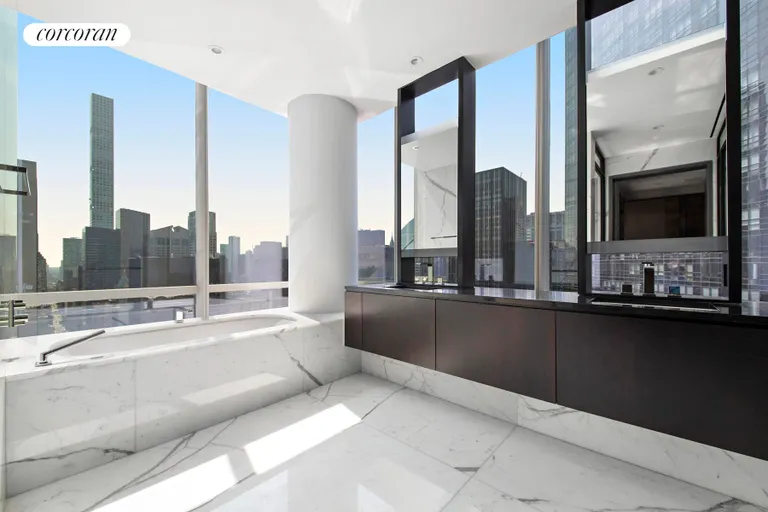 New York City Real Estate | View 157 West 57th Street, 41D | Primary Bathroom | View 10