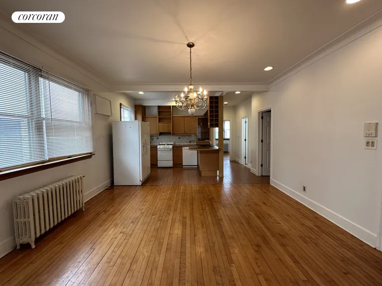 New York City Real Estate | View 68-11 59th Road, 1 | 2 Beds, 1 Bath | View 1