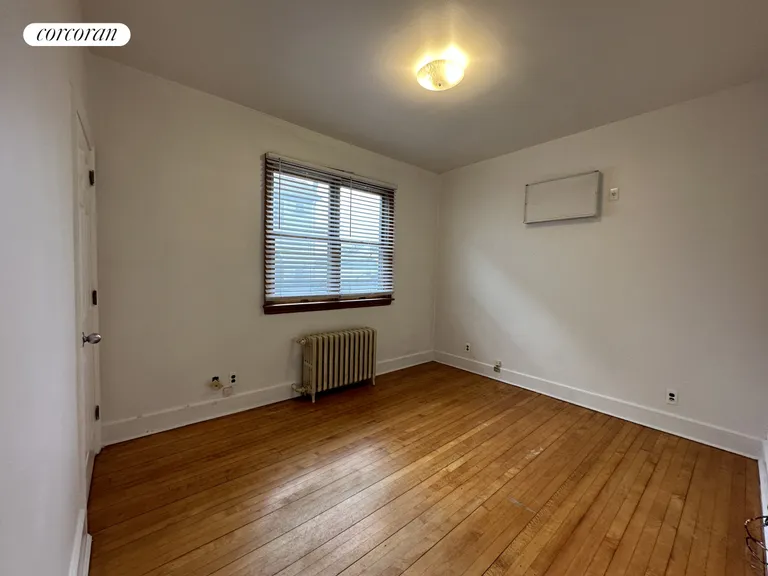 New York City Real Estate | View 68-11 59th Road, 1 | Bedroom | View 4