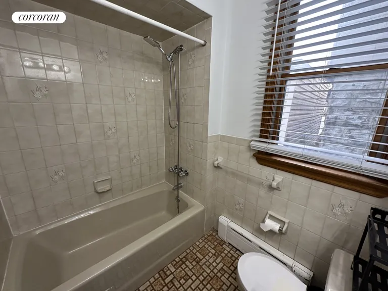 New York City Real Estate | View 68-11 59th Road, 1 | Full Bathroom | View 6