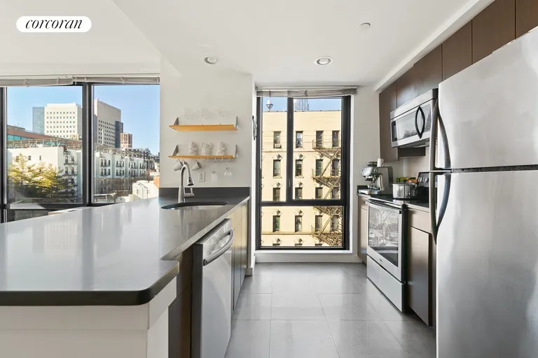 New York City Real Estate | View 1595 Lexington Avenue, 5E | Open, windowed kitchen | View 3