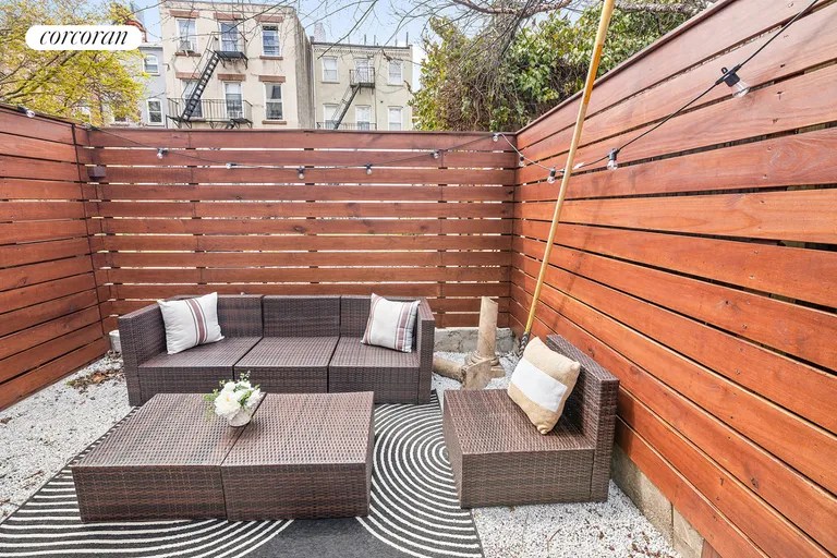 New York City Real Estate | View 225 Baltic Street, 1R | Lower level of private yard | View 12