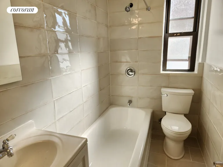 New York City Real Estate | View 445 West 240th Street, 4A | Bath with Tub & window | View 15