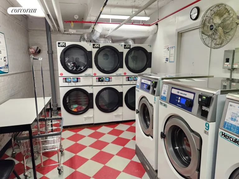 New York City Real Estate | View 445 West 240th Street, 4A | Laundry room in building | View 21