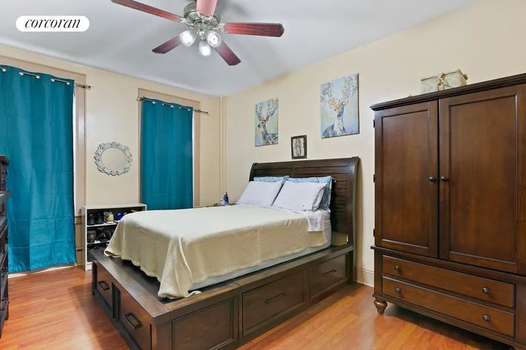 New York City Real Estate | View 71-39 68th Street | First floor primary bedroom | View 5