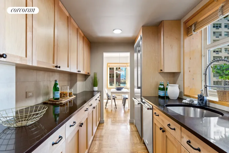 New York City Real Estate | View 36 Sutton Place South, 3C | Pass thru Kitchen w/wnd to East Riv | View 5
