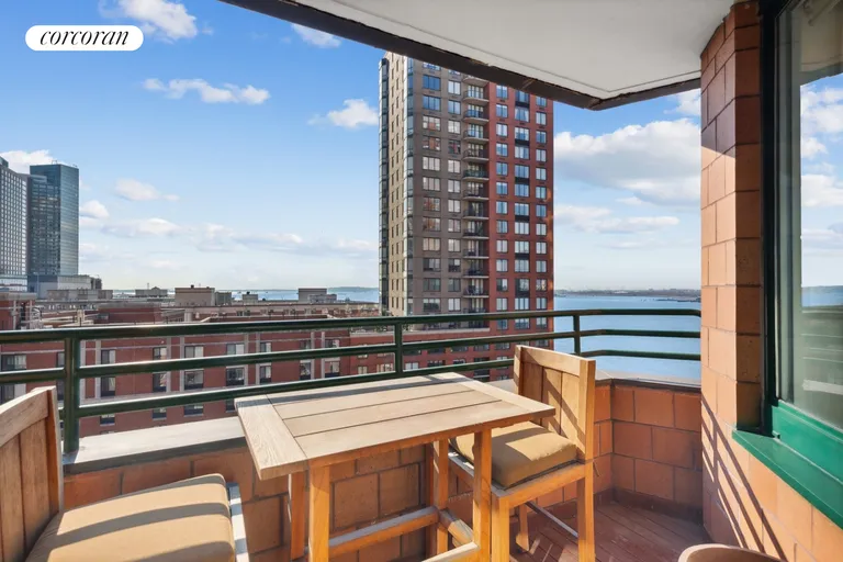 New York City Real Estate | View 333 Rector Place, 1207 | Balcony with Water Views | View 2