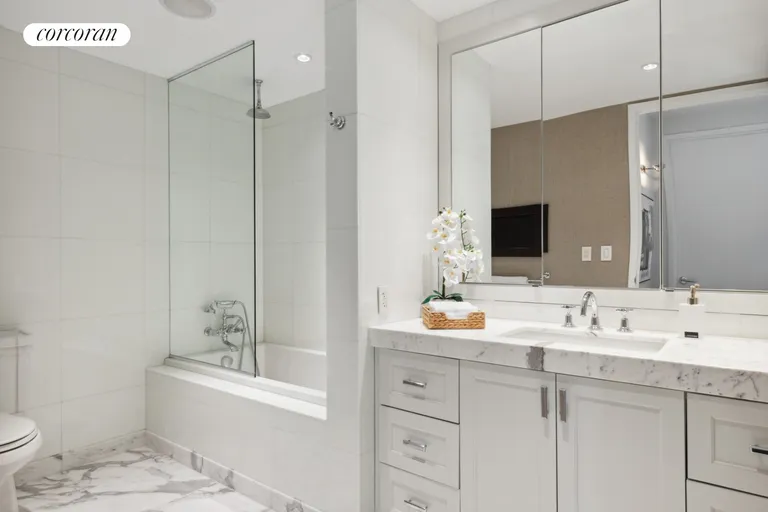 New York City Real Estate | View 333 Rector Place, 1207 | Marble Bathroom | View 9