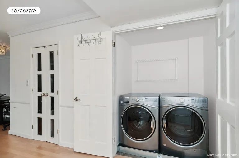 New York City Real Estate | View 340 East 64th Street, 21A | Laundry closet in apartment | View 5