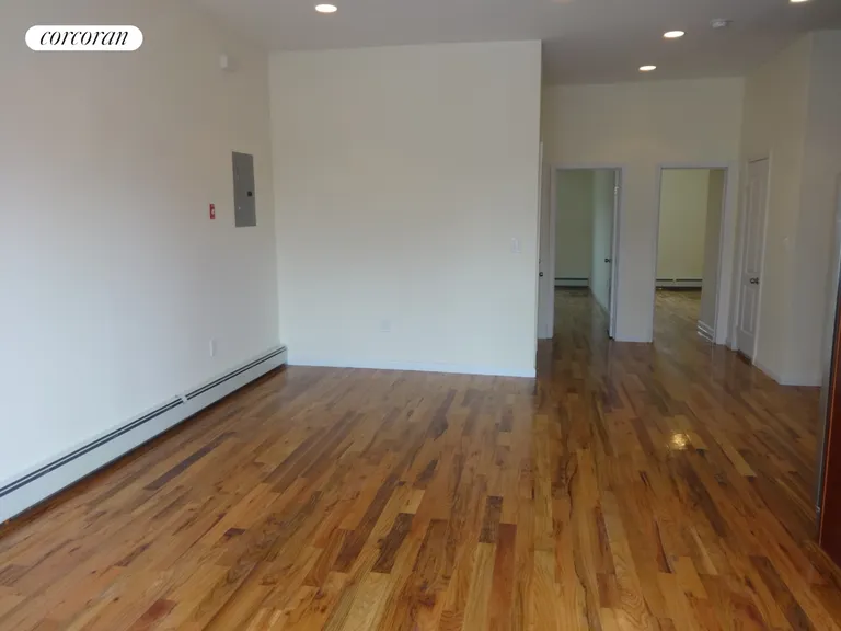 New York City Real Estate | View 2340 Matthews Avenue | Living room opposite view | View 5