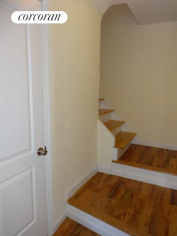 New York City Real Estate | View 2340 Matthews Avenue | Stairs up to apt from entry lobby | View 15