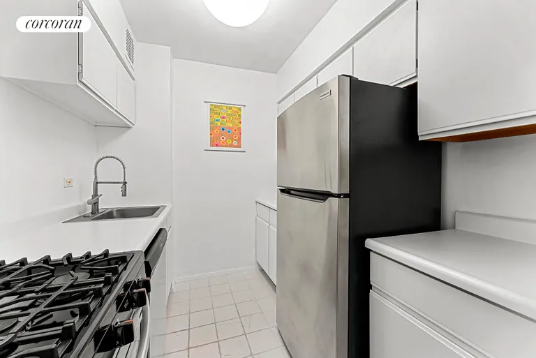 New York City Real Estate | View 30 East 9th Street, 6II | Kitchen with new appliances | View 4