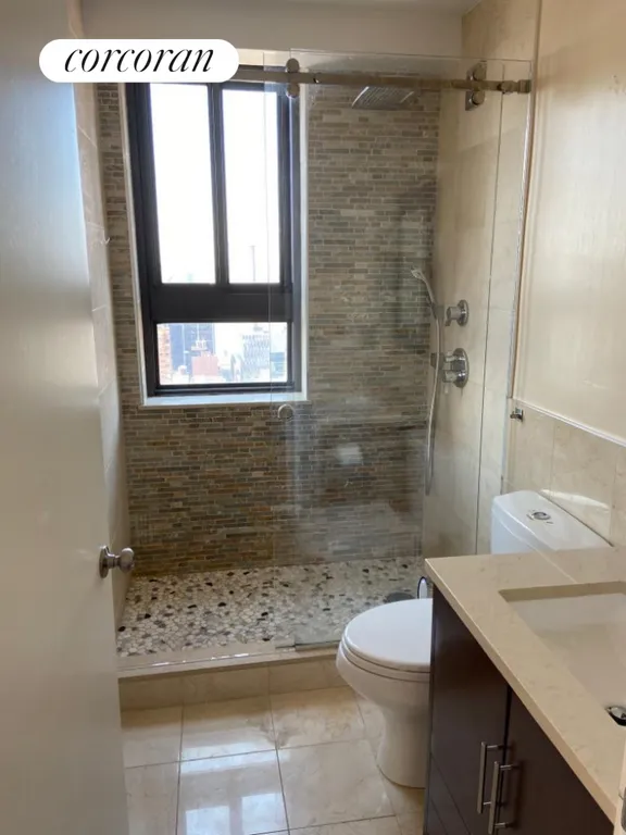 New York City Real Estate | View 347 West 57th Street, 43A | Primary Bathroom | View 9