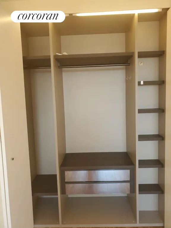 New York City Real Estate | View 347 West 57th Street, 43A | His/hers closets with inserts | View 12