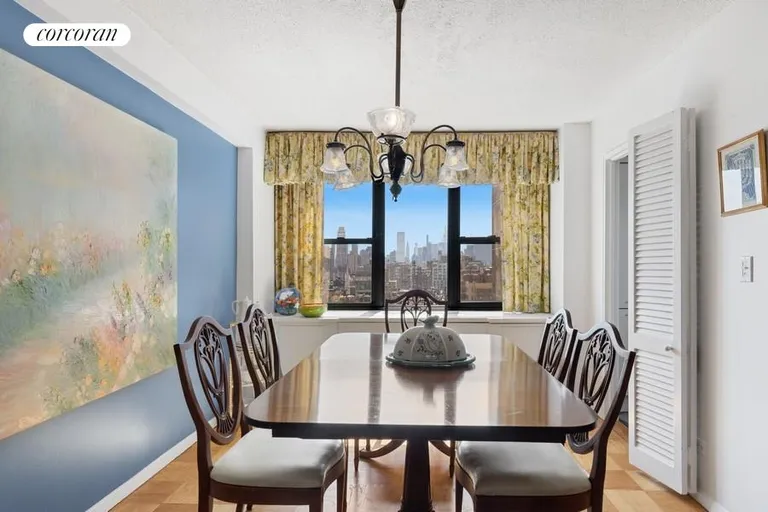 New York City Real Estate | View 111 East 85th Street, 20D | Formal Dining Room | View 4