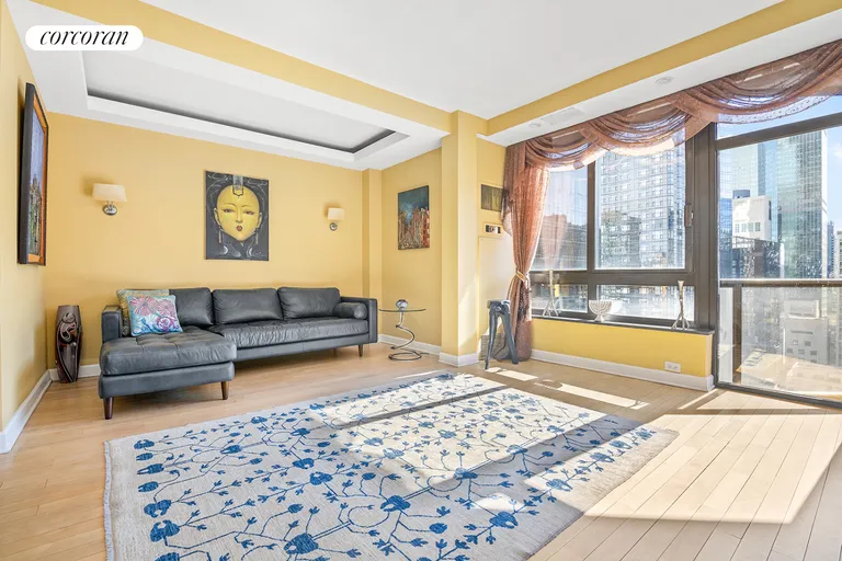 New York City Real Estate | View 100 United Nations Plaza, 27C | Living room with private balcony | View 2