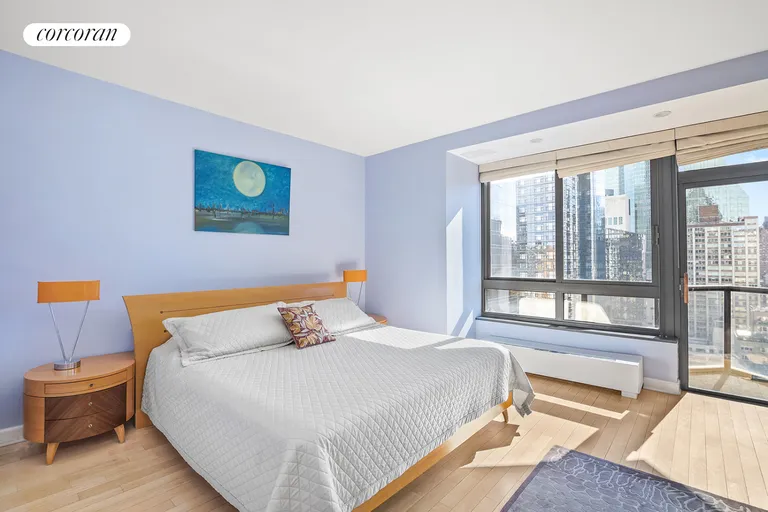 New York City Real Estate | View 100 United Nations Plaza, 27C | Primary bedroom w/ balcony | View 5
